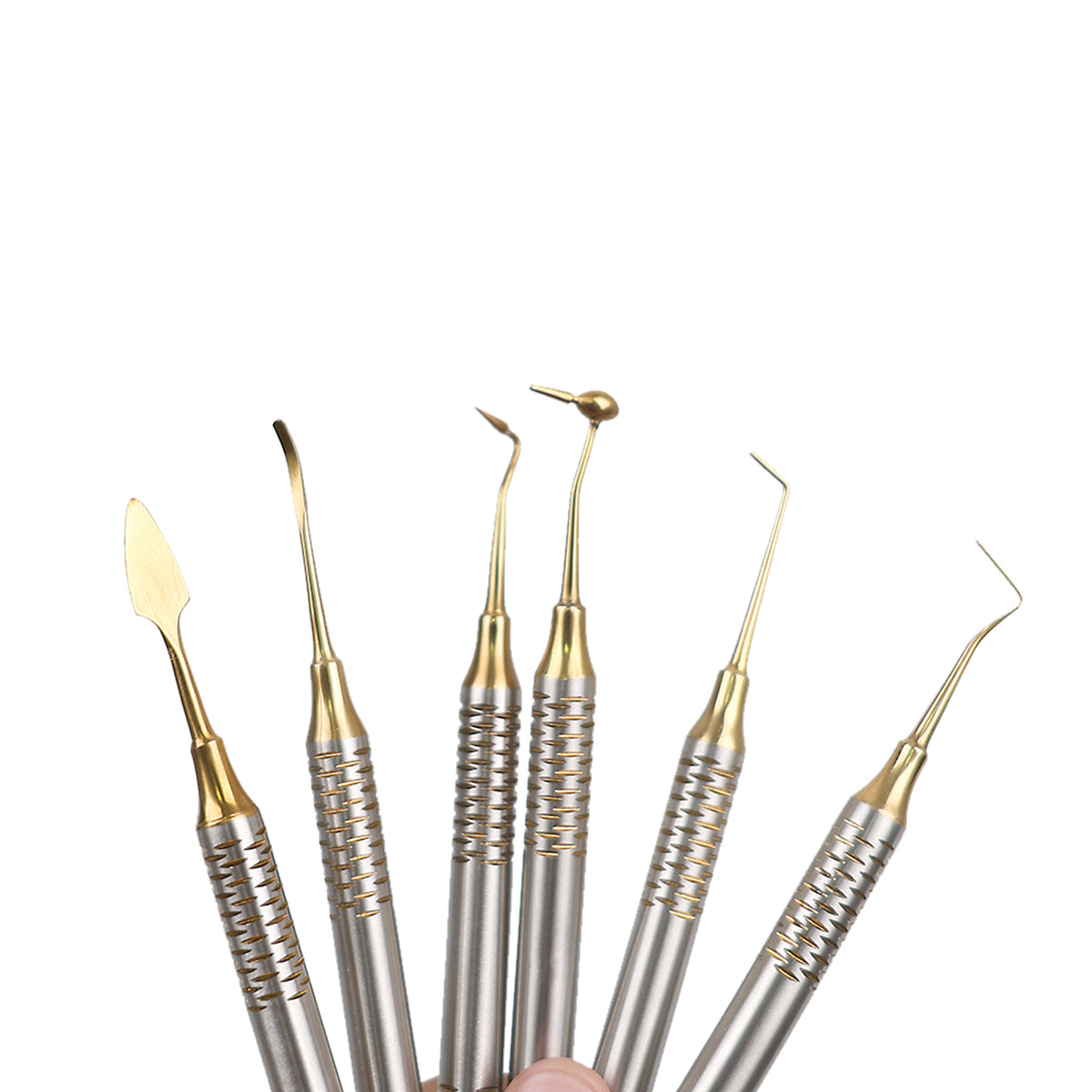 Gold coated composite filling instruments group closeup