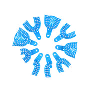 Blue disposable perforated dental impression trays set, white background