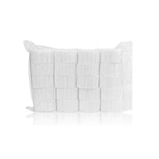 Bulk packed disposable dental cotton rolls, white background
