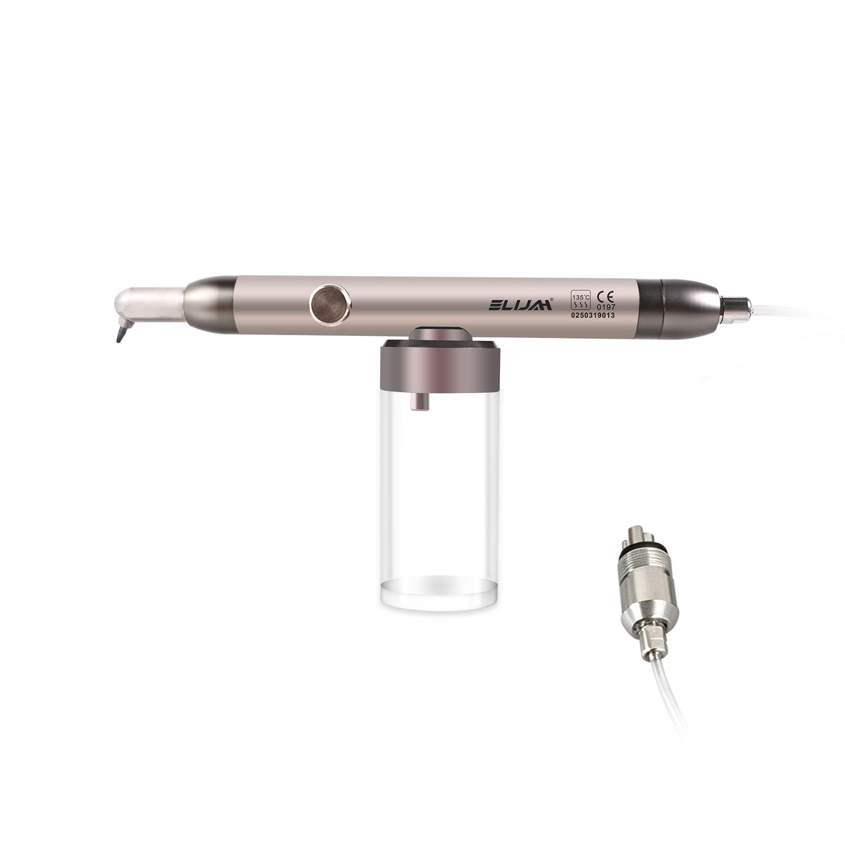 Dentist using sandblasting gun inside patient mouth