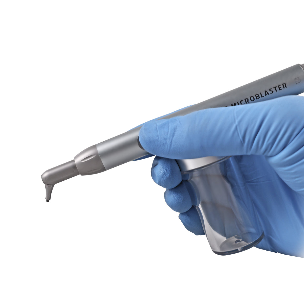 Microblaster set placed on dental lab workbench