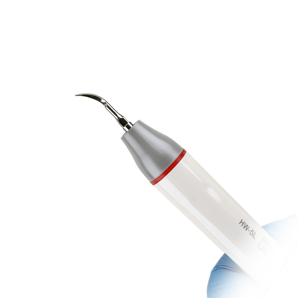 Dentist using built‑in ultrasonic scaler for scaling periodontal treatment